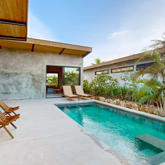 Waterfront villa with pool, spacious deck, dog-friendly & office space - Image 1