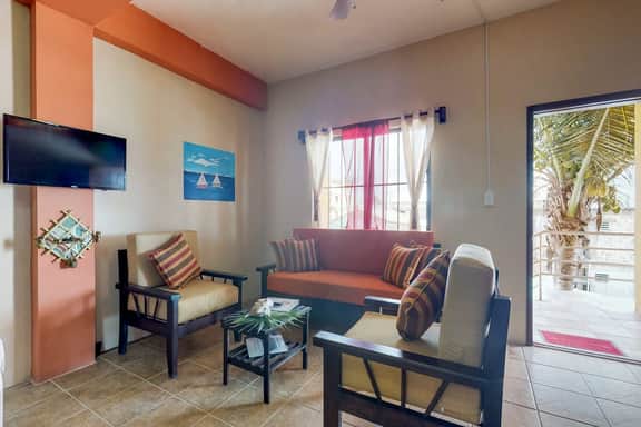 Ideally located apartment w WiFi, partial AC & shared rooftop - steps to the sea