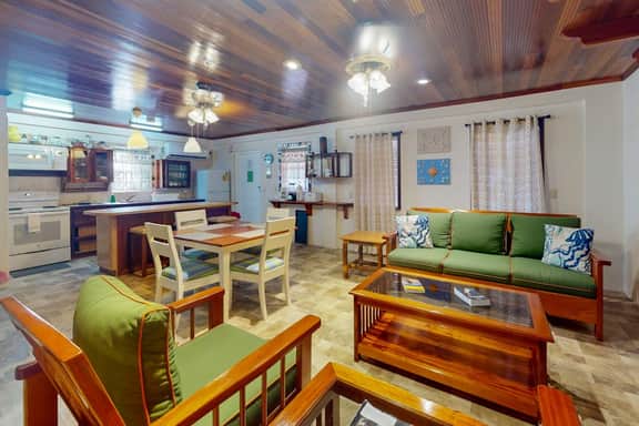 Air-conditioned suite with WiFi and a shared pool & terrace - walk to the beach