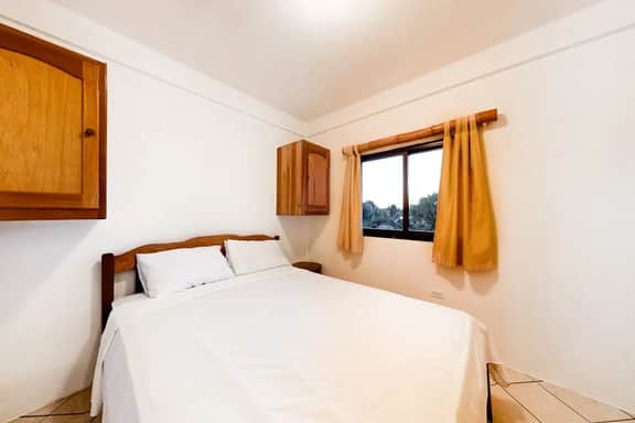 Cozy Suite for Two with WiFi, AC, Shared Pool, Grill & Sunsets from the Rooftop