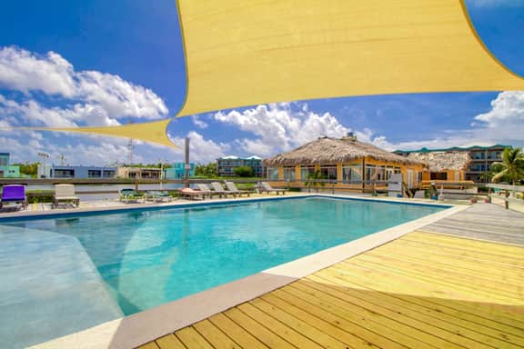 Well-Located Beachfront Apartment with Ocean View, Pool, Central AC, & WiFi