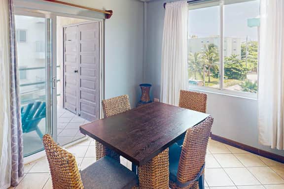 Waterfront condo with pool & high-speed WiFi - walk to the nearby beach