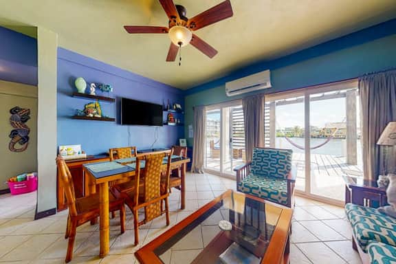 Cozy Waterfront Villa Home w Shared Pool, Water Views, WiFi, & AC - Walk to the Beach