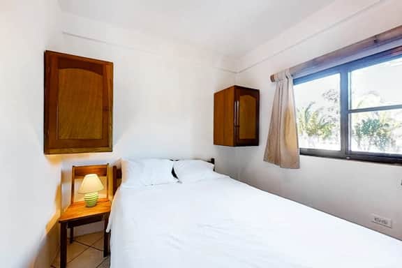 Affordable Suite with WiFi, Partial AC, Shared Rooftop Deck, Pool, and Grill