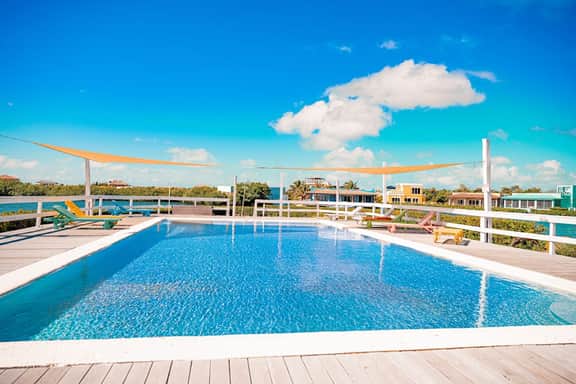Waterfront villa with outdoor pool, washer dryer, & central AC