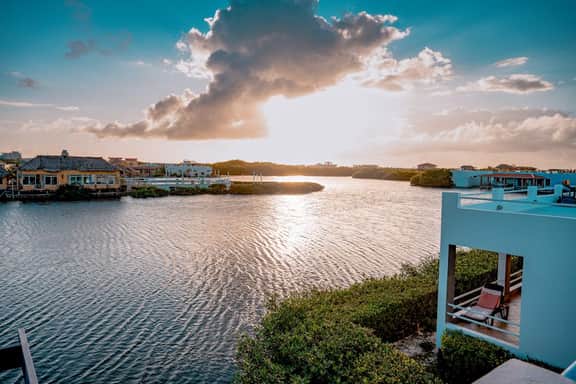 Waterfront villa with outdoor pool, washer dryer, & central AC