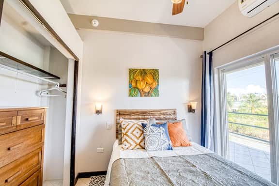 Colorful ocean-view suite with pool & concierge - near dining & town