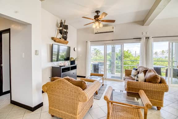 Colorful ocean-view suite with pool & concierge - near dining & town