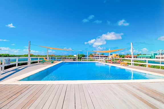 Sea-view, dog-friendly condo with pool & central AC- between the beach & lagoon