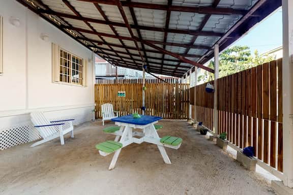Tropical studio w patio, WiFi, AC - steps to the sea, water taxis & restaurants