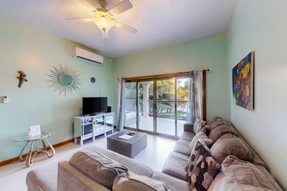 Relaxing condo with shared pool, ocean views, partial AC & WiFi