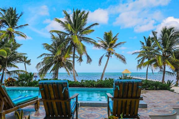 Relaxing condo with shared pool, ocean views, partial AC & WiFi