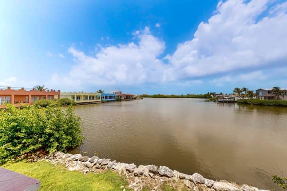 Caribbean condo with ocean view, on-site pool, & private balcony