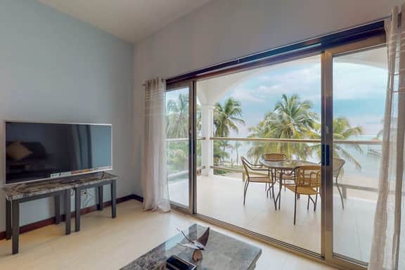 Oceanfront condo with amazing water views, partial AC, WiFi & pool