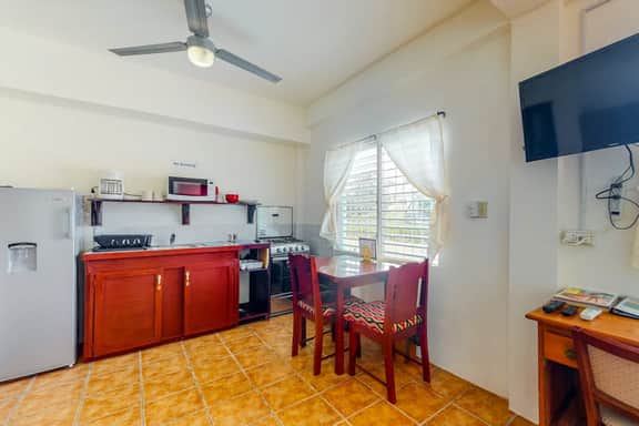 Bright studio w complimentary bikes, kitchen, picnic area, WiFi & partial AC