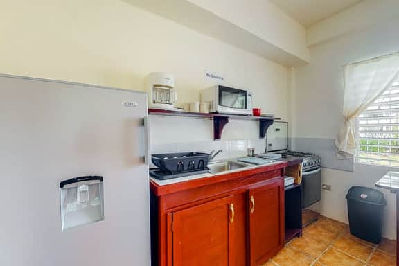 Bright studio w complimentary bikes, kitchen, picnic area, WiFi & partial AC