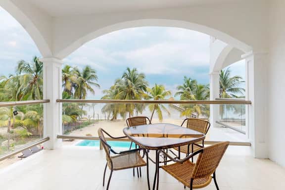 Oceanfront condo with amazing water views, partial AC, WiFi & pool