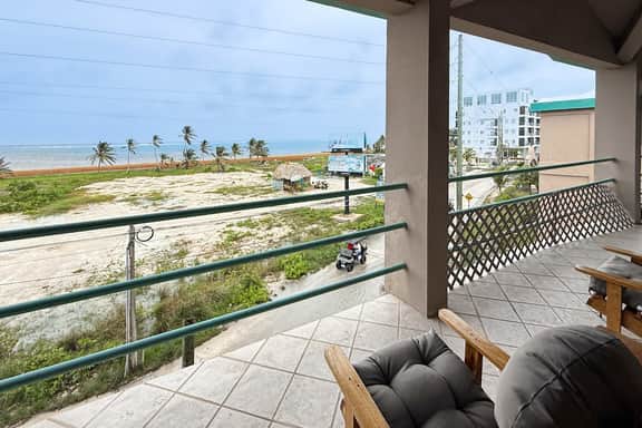 Ocean-view home with balcony, swimming pool & central AC