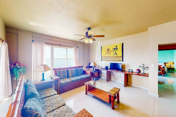 Waterfront resort villa with water views, balcony, full kitchen, & washer dryer