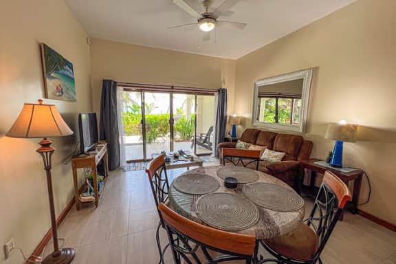 Colorful oceanfront condo with shared pool and jetted tub