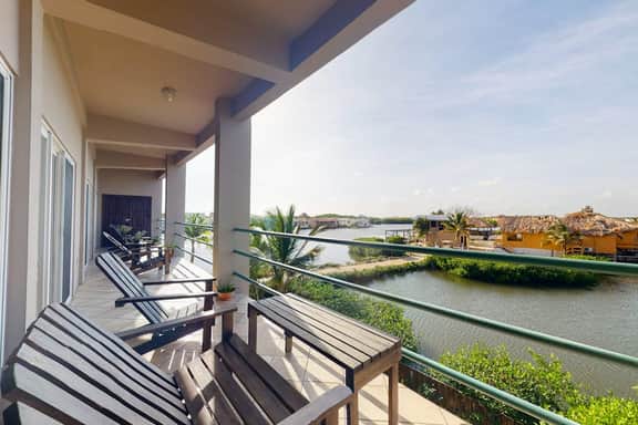 Fabulous condo w lagoon view, WiFi, central AC, shared pool & central location