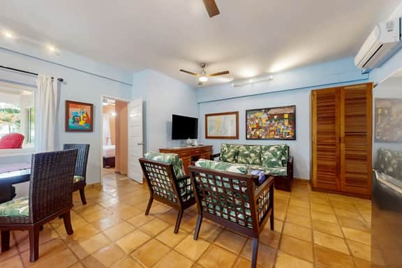 Tranquil ocean-view escape with shared pool, beach access, AC, & free wifi
