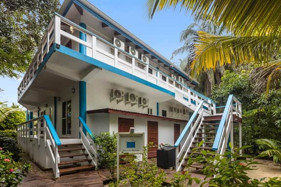Tranquil ocean-view escape with shared pool, beach access, AC, & free wifi
