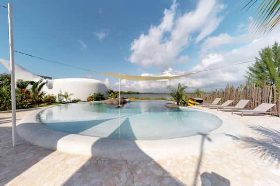 Unique waterfront studio with AC, pool, bikes, & kayaks
