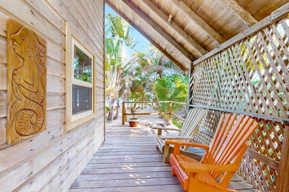 Romantic beachfront home with ocean views, dock, free WiFi, and outdoor dining