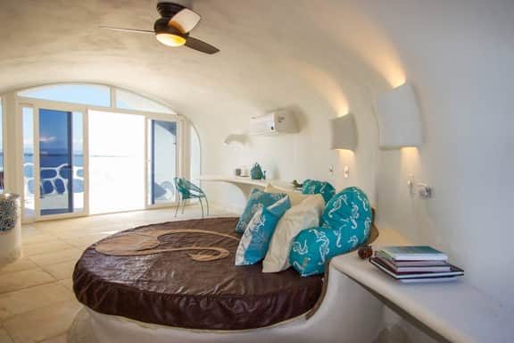 Lagoon-front studio with water access, infinity pool, & AC