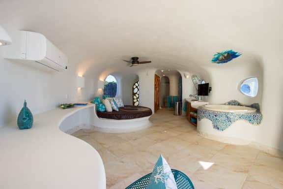 Lagoon-front studio with water access, infinity pool, & AC