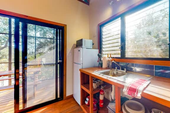 Three forest cabanas with verandas, hammocks, WiFi & partial AC - walk to beach