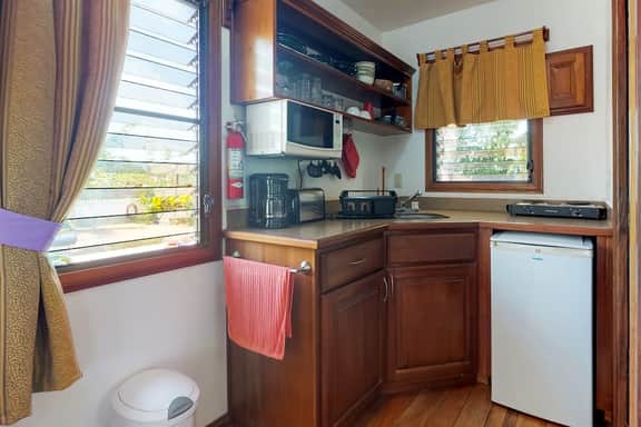Cabana with WiFi and a shared pool, patio area, and grill - walk to the beach