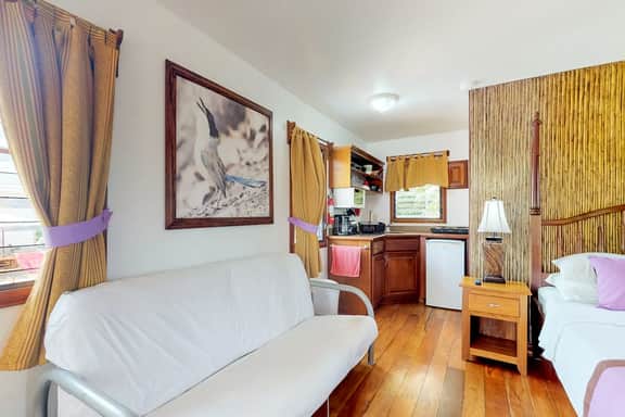 Cabana with WiFi and a shared pool, patio area, and grill - walk to the beach