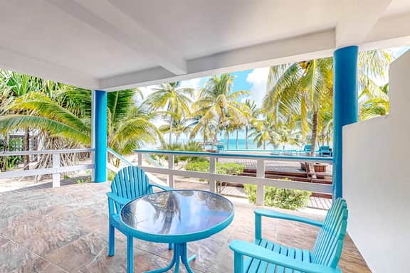 Charming, beachfront condo with shared outdoor pool, central AC, & free WiFi