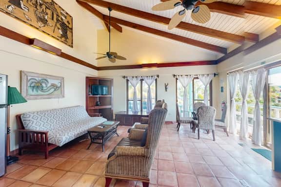 Ocean view condo at beachfront complex with AC, free WiFi, & pool