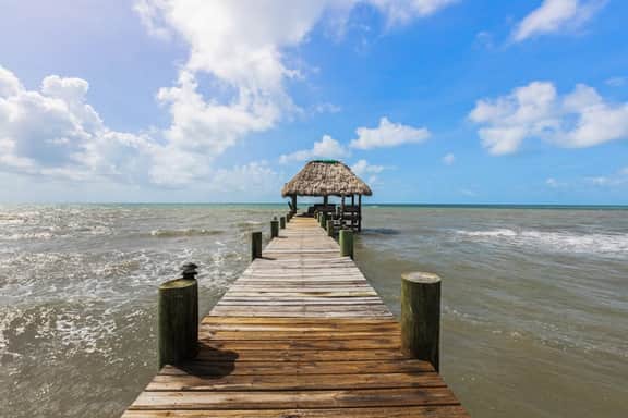 Tropical beachfront getaway with private pool, ocean views & enclosed yard
