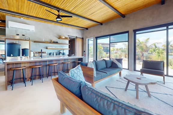 Elegant waterfront villa with private terrace, pool, beach access & 4 en-suites