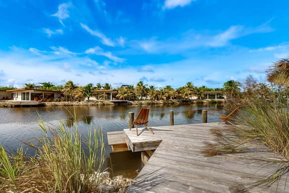 Water-view villa with plunge pool, private deck, full kitchen & partial AC