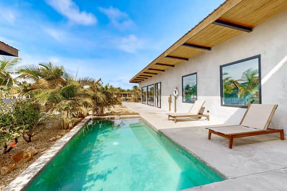 Water-view villa with plunge pool, private deck, full kitchen & partial AC