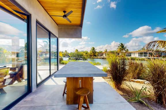 Elegant waterfront villa with private pool, terrace and beach club access