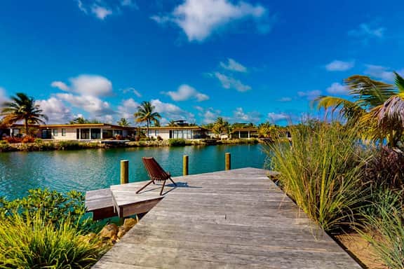 Elegant waterfront villa with private pool, terrace and beach club access