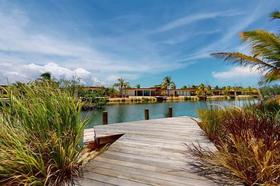Spacious dog-friendly villa with king beds, private pool, water views & BBQ deck