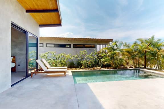 Spacious dog-friendly villa with king beds, private pool, water views & BBQ deck