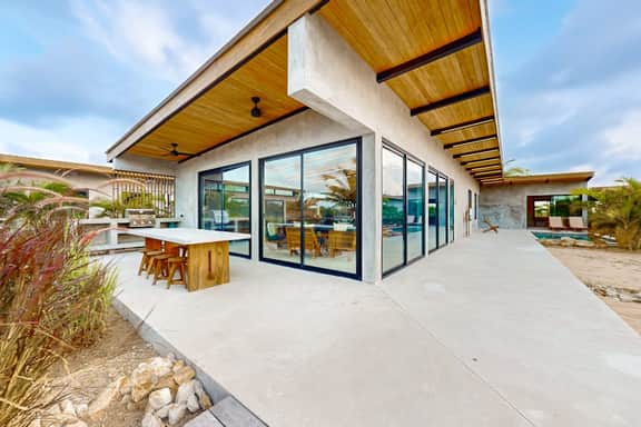 Waterfront villa with pool, spacious deck, dog-friendly & office space