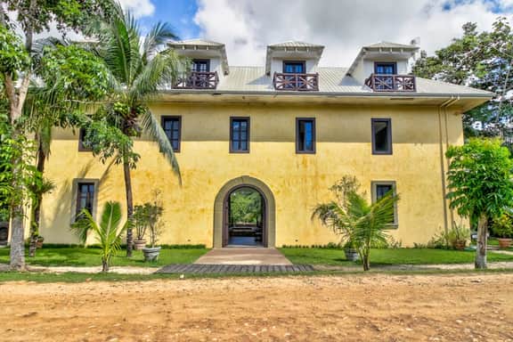 Riverfront Retreat with Balcony, WiFi, Partial AC, Shared Pool