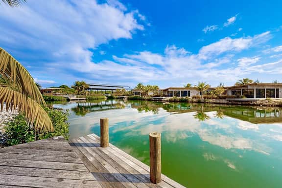 Spacious waterfront villa with splash pool, beach access & private terrace