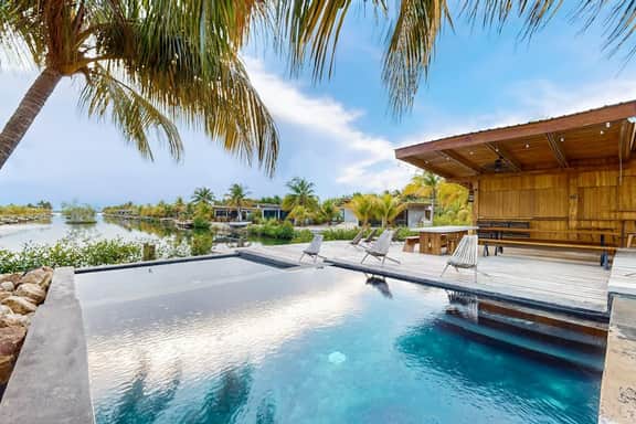 Spacious waterfront villa with splash pool, beach access & private terrace