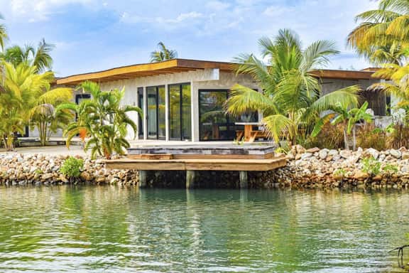 Tranquil villa with water views, private pool, deck dining, WiFi & AC