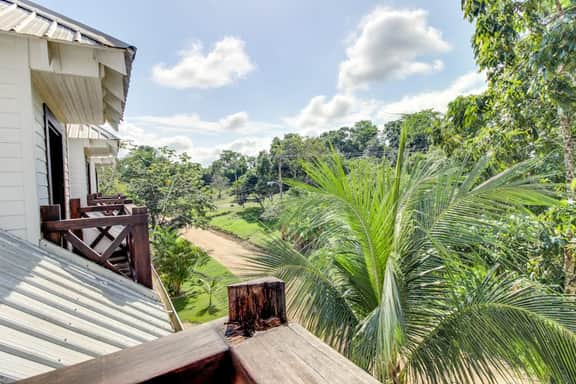 Riverfront Suite with Balcony, WiFi, AC, Infinity Pool & Forest View